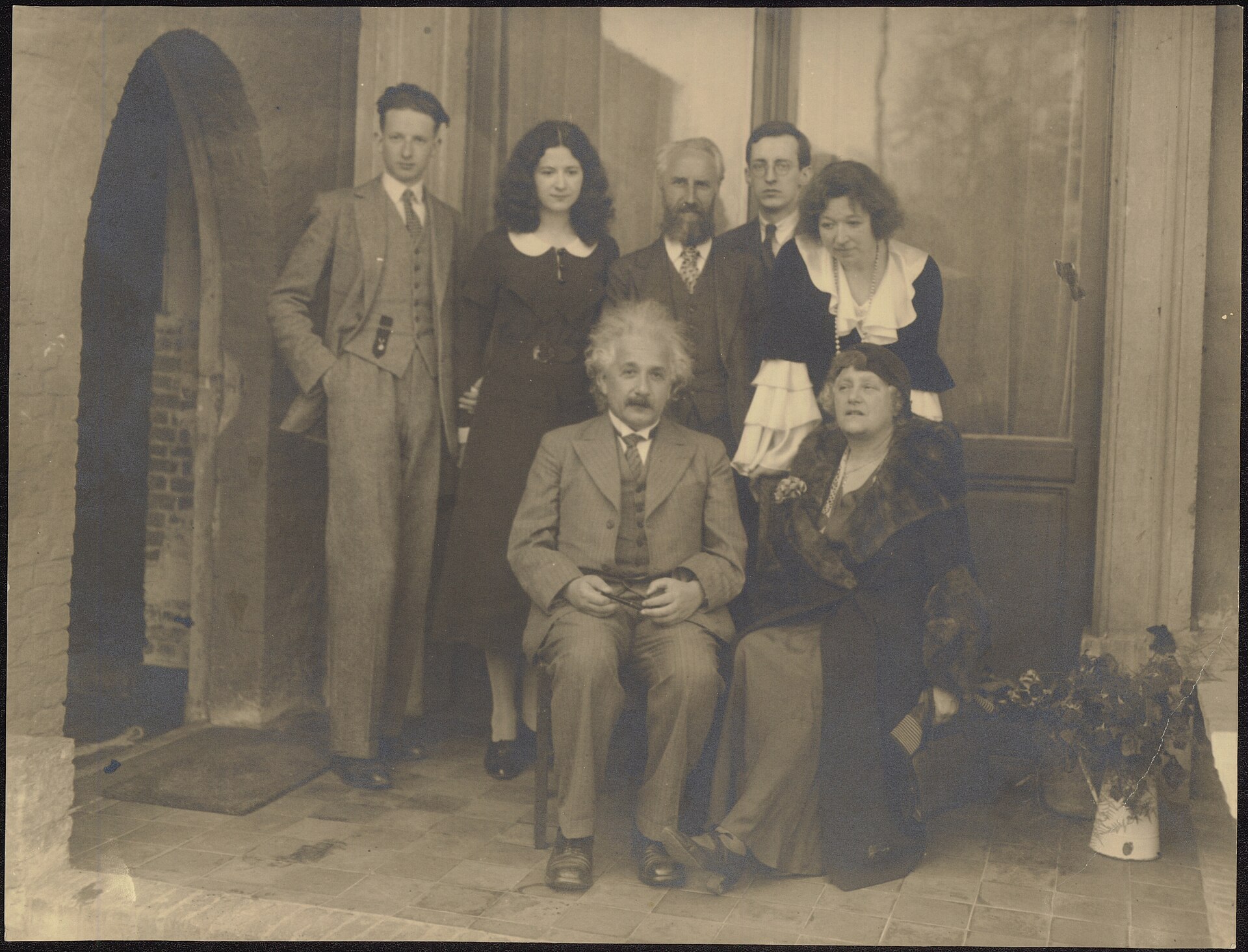 Albert Einstein and his wife Elsa, seated at the front, at a reception at Cantecroy Castle in Mortsel in 1933.