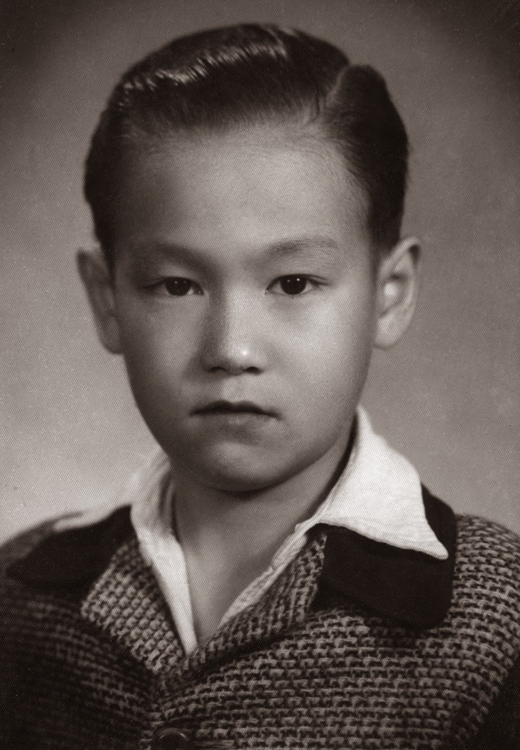 Bruce Lee as a child with his family in 1946.