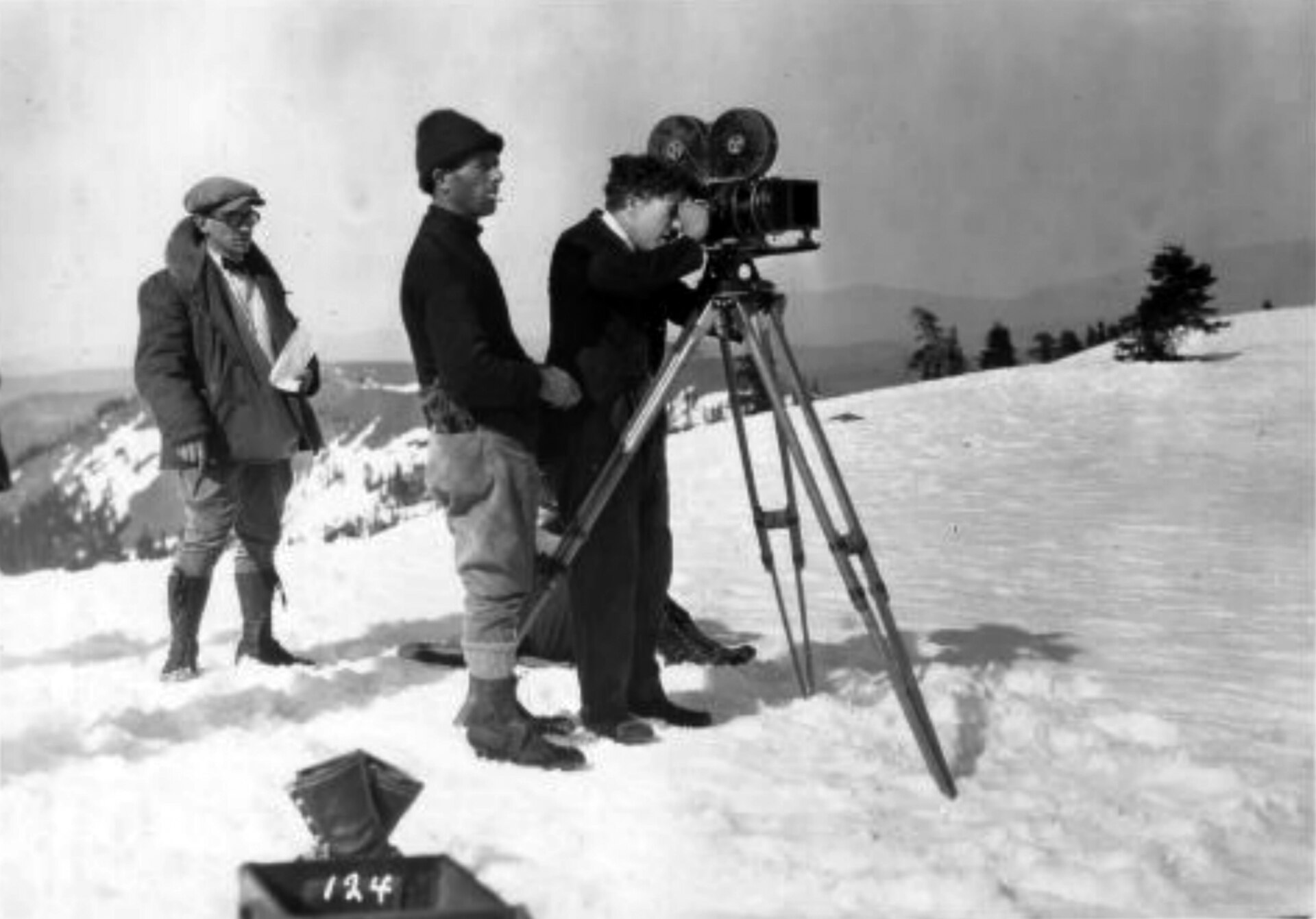 Charlie Chaplin operating a camera on the set of The Gold Rush.