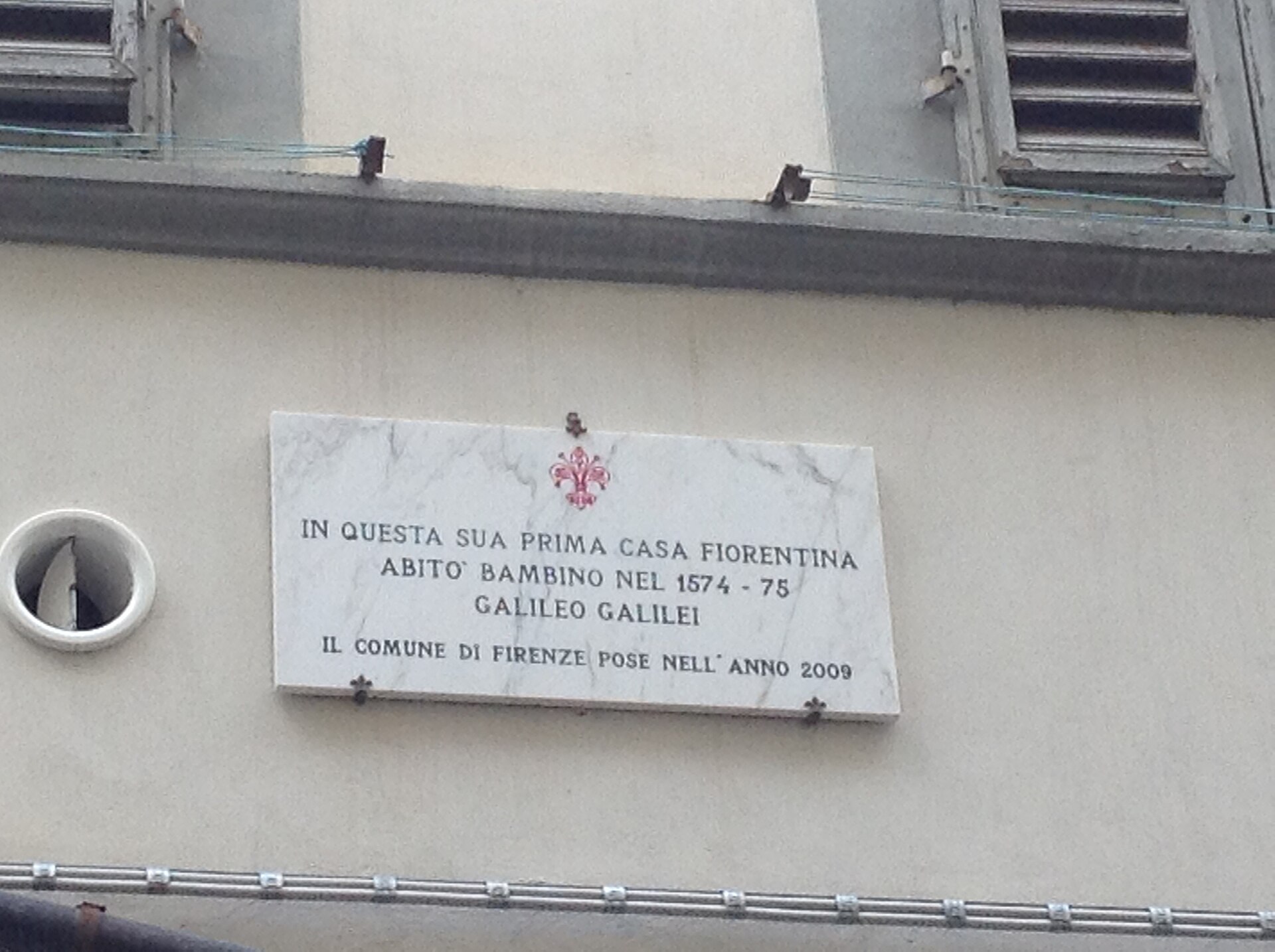 Plaque on Via della Chiesa marking where Galileo Galilei lived as a child.