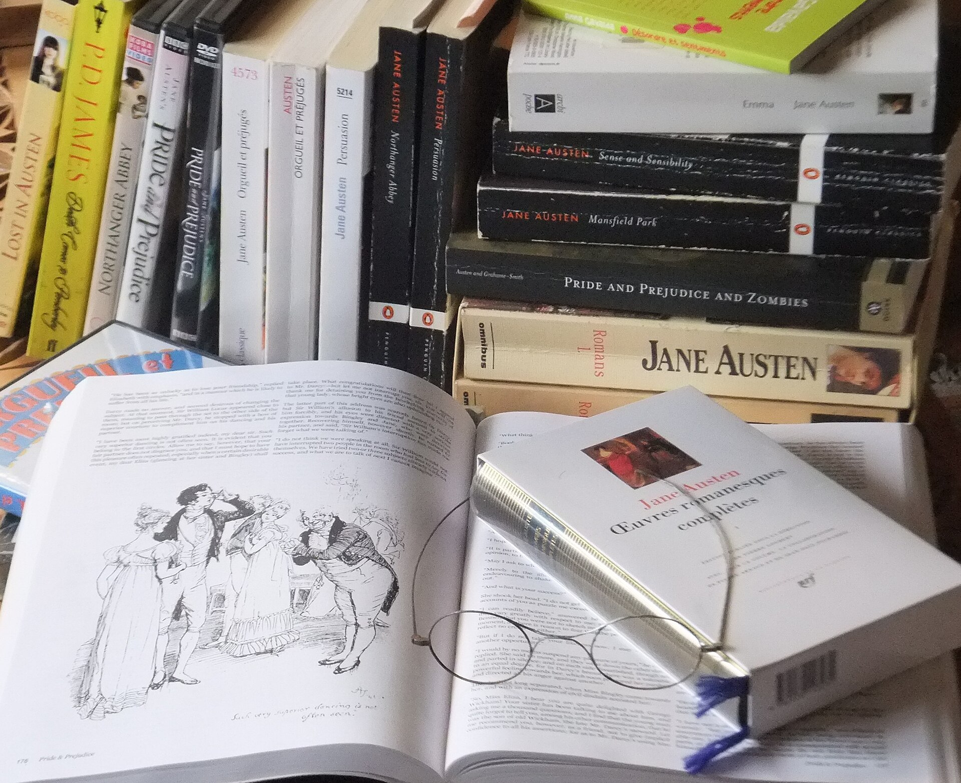 A small library of Jane Austen's novels in various editions and translations. — Eymery, CC BY-SA 3.0 (Wikimedia Commons)