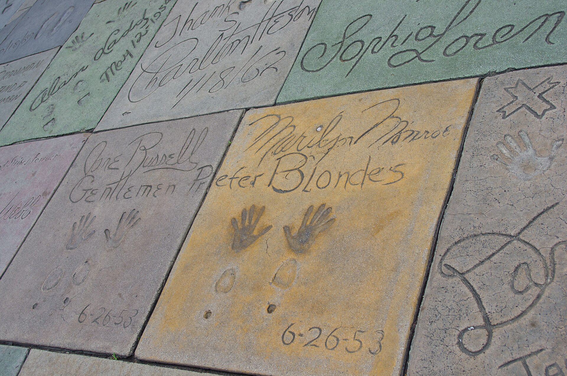 The hand and footprints of Marilyn Monroe at Grauman's Chinese Theatre in Hollywood. — Antoine Taveneaux, CC BY-SA 3.0 (Wikimedia Commons)