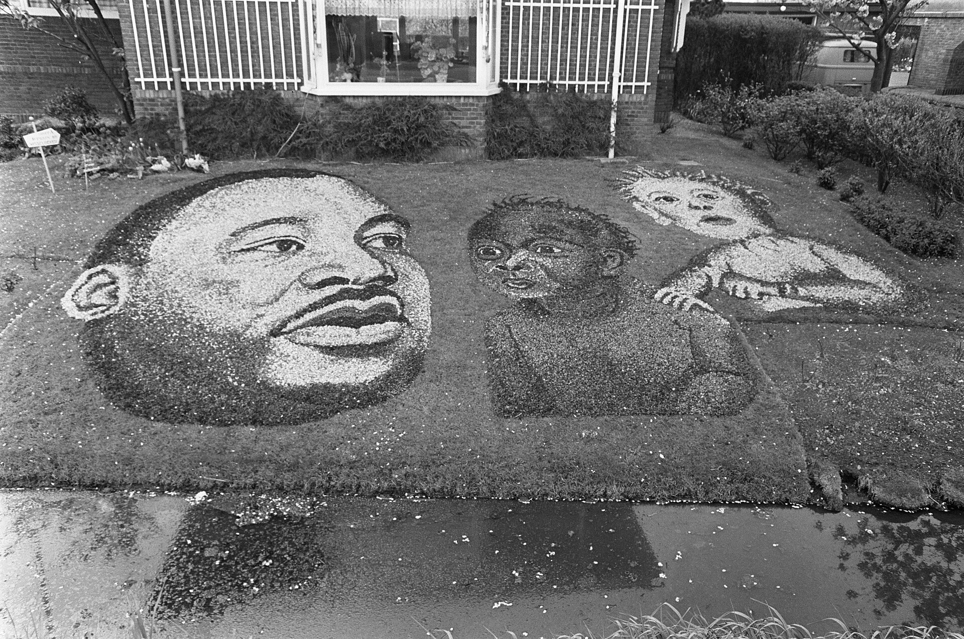 A floral mosaic portrait of Martin Luther King Jr., created in 1966.