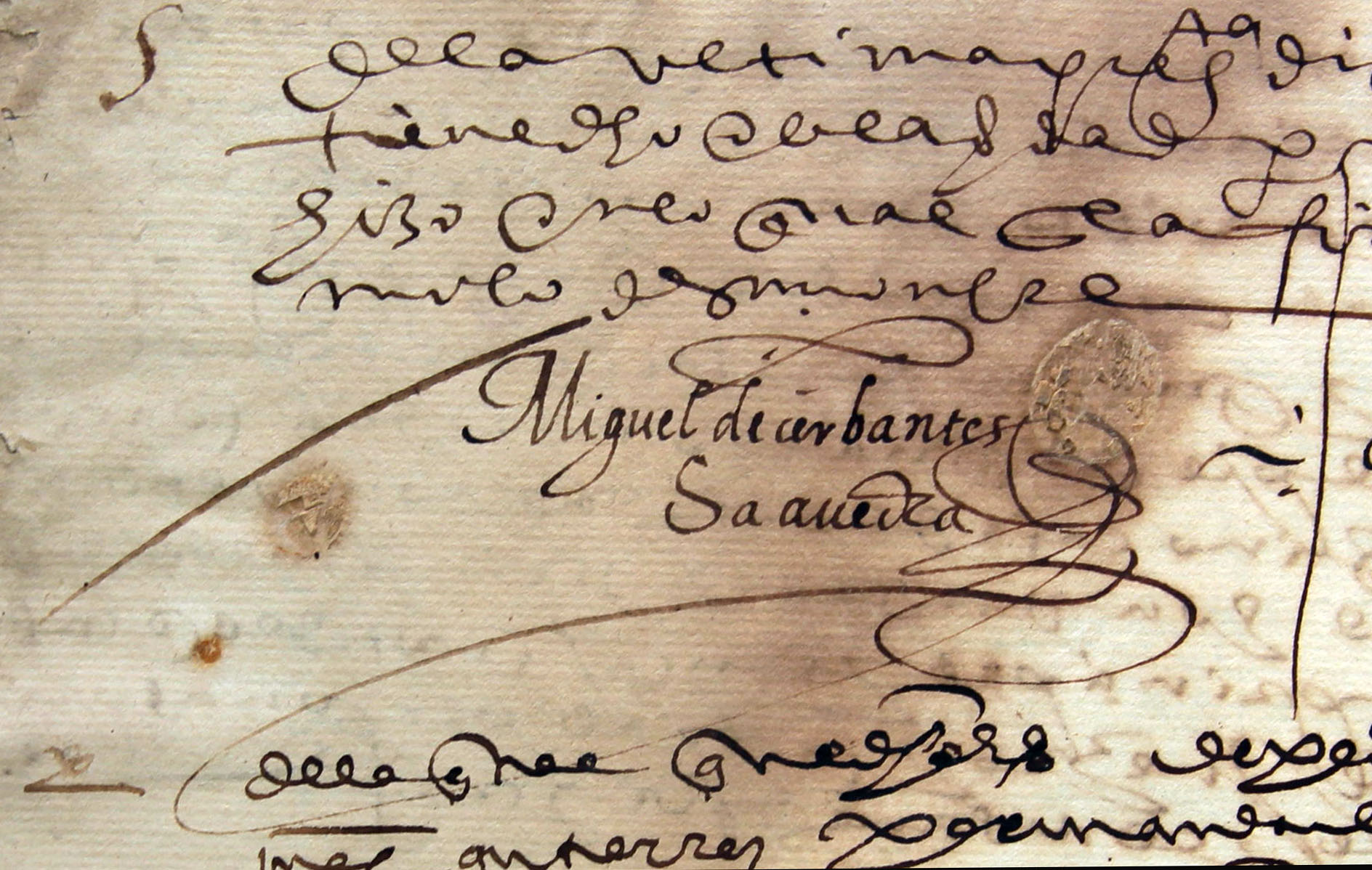 A close-up of Miguel de Cervantes' handwritten signature, preserved in a 1593 legal manuscript in Sevilla. — Fondo Antiguo de la Biblioteca de la Universidad de Sevilla from Sevilla, España, CC BY 2.0 (Wikimedia Commons)
