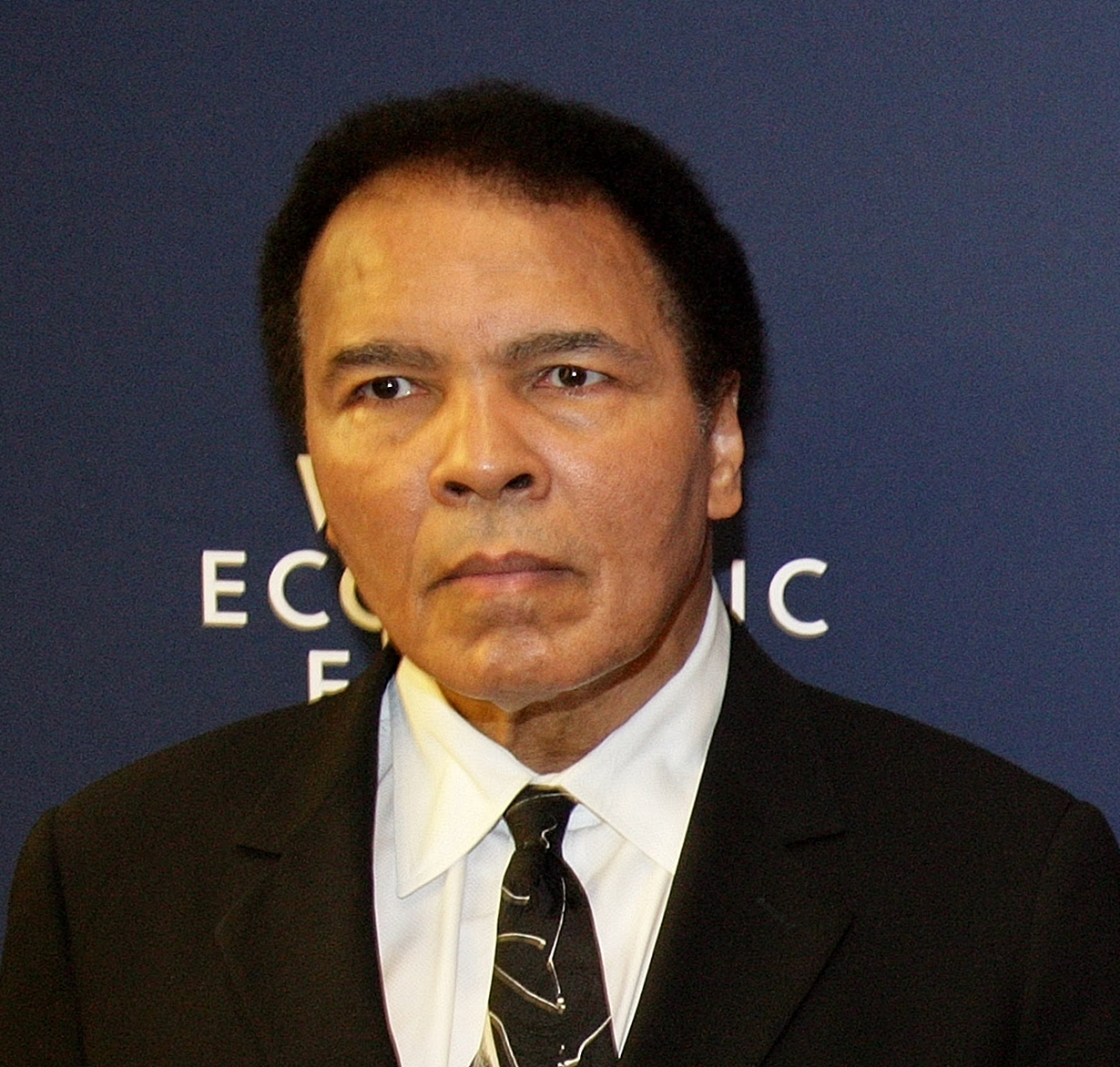 Muhammad Ali at the World Economic Forum annual meeting in Davos, January 2006. — World Economic Forum from Cologny, Switzerland, CC BY-SA 2.0 (Wikimedia Commons)