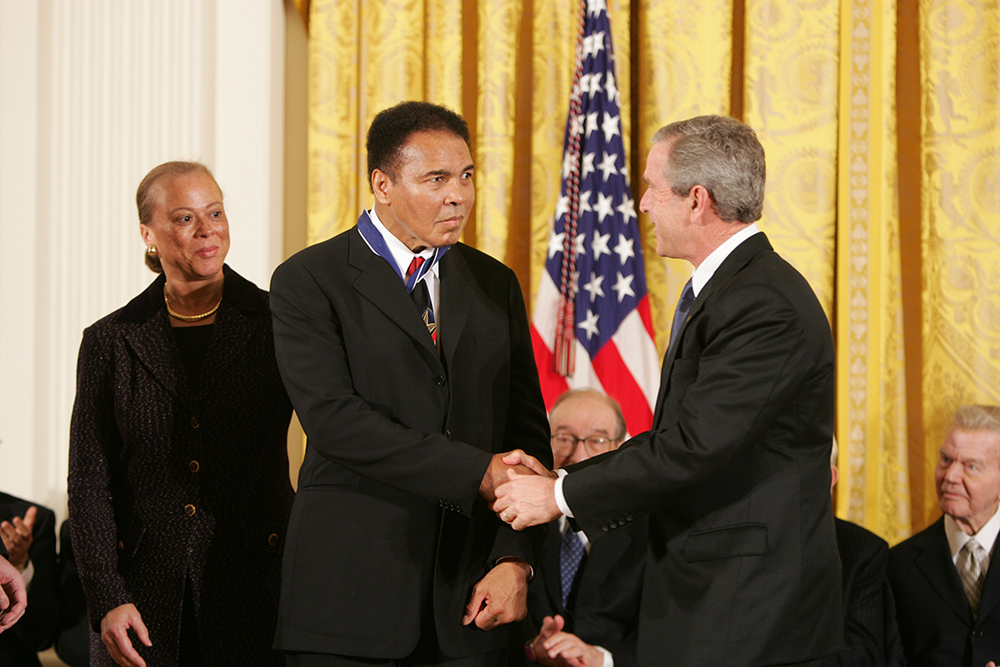 Muhammad Ali receiving the Presidential Medal of Freedom from President George W. Bush, November 2005.