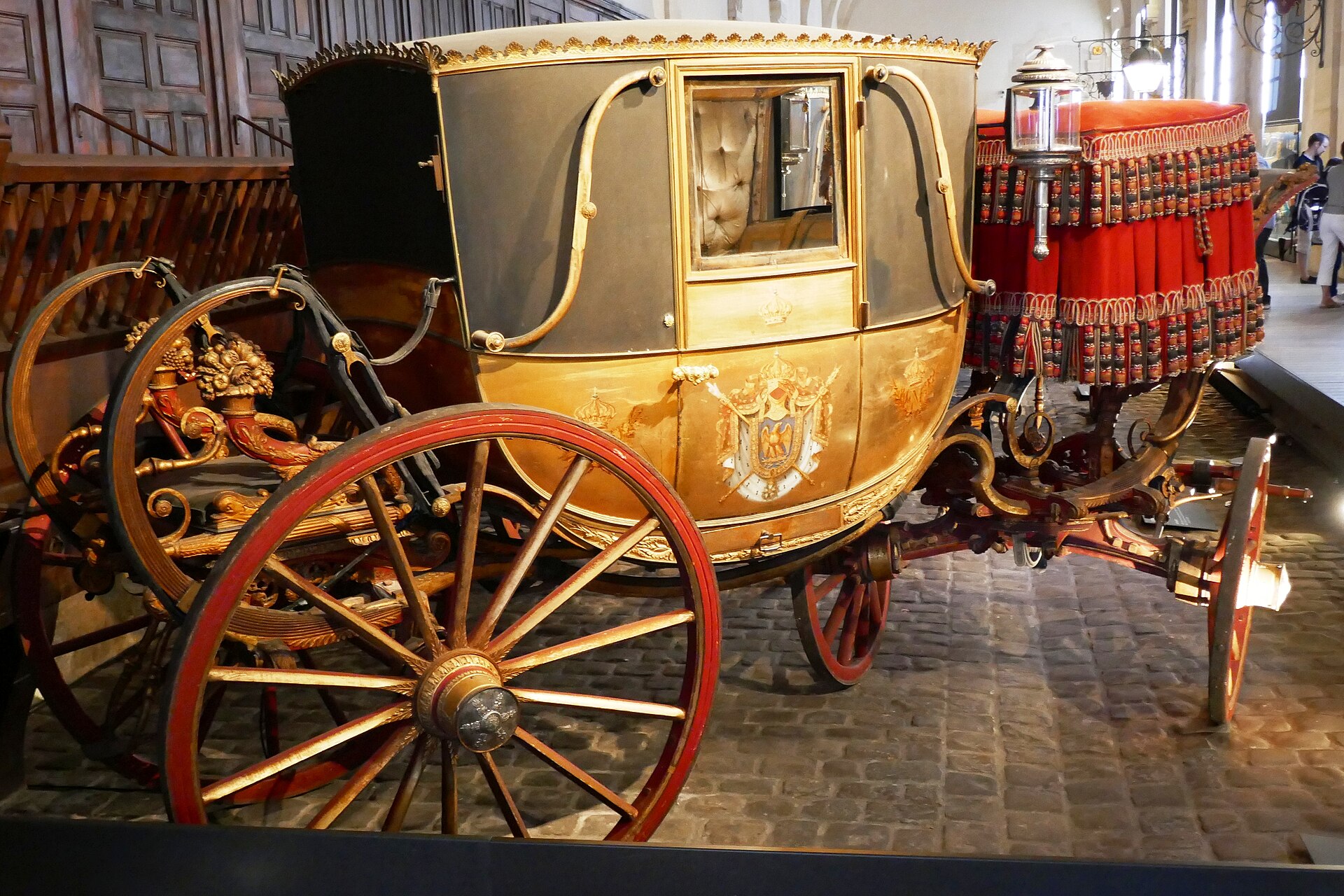 The Cornaline ceremonial carriage, built in 1810 for the marriage of Napoleon I and Marie-Louise. — FR, CC BY-SA 4.0 (Wikimedia Commons)