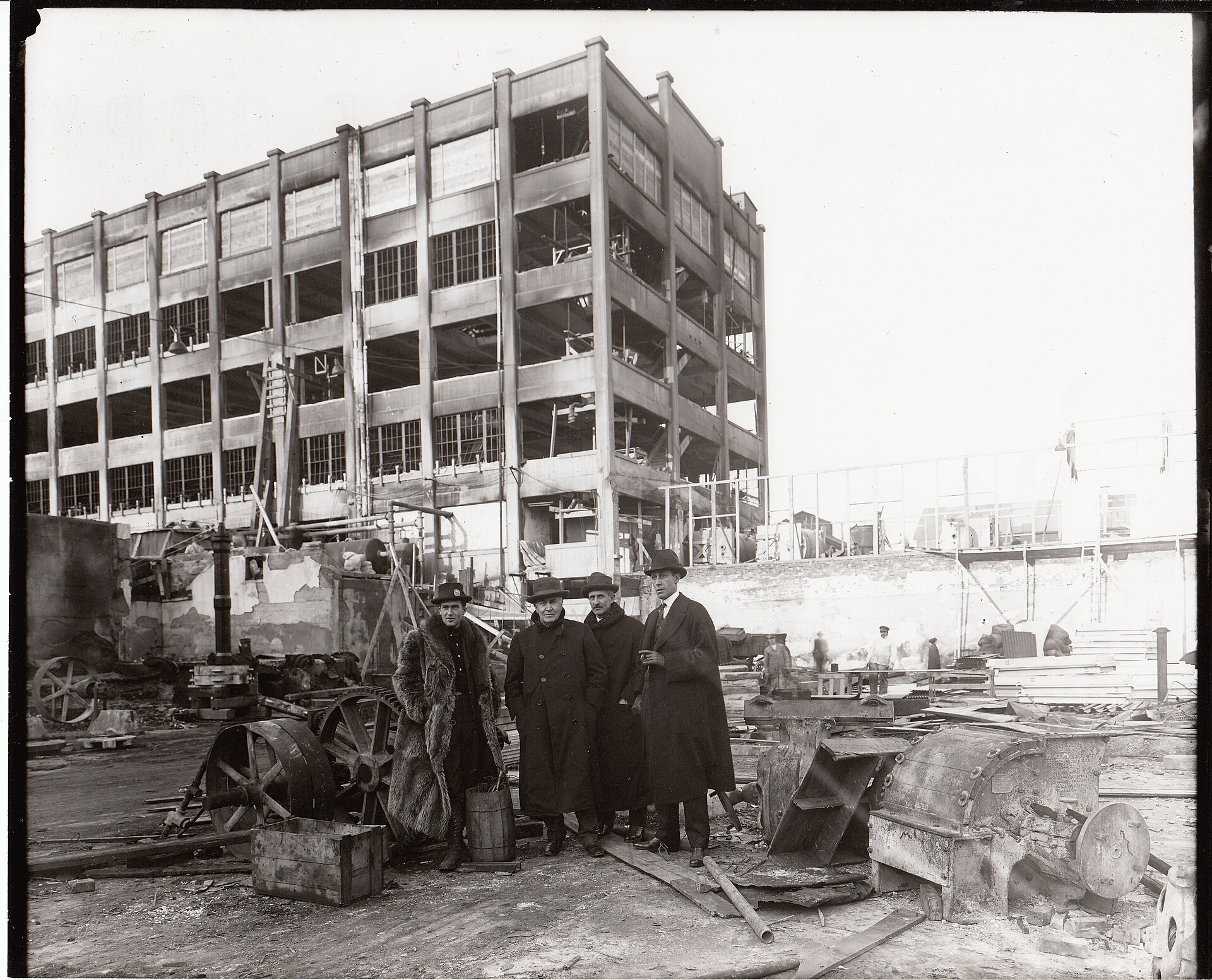 Thomas Edison with his son Charles and colleagues in the yard after a fire at his West Orange laboratory.
